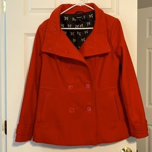 Torrid red pea coat, polyester outer and lining.